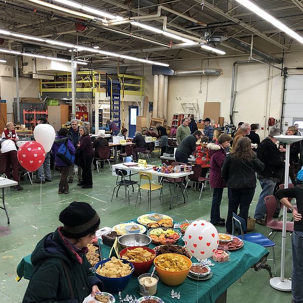 Visitors to the Repair Fair enjoy refreshments and get their items fixed