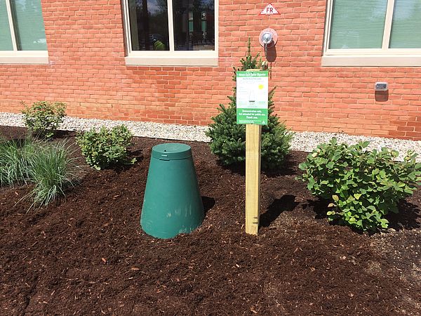 Green cone installed in garden bed behind Middlebury Town Offices