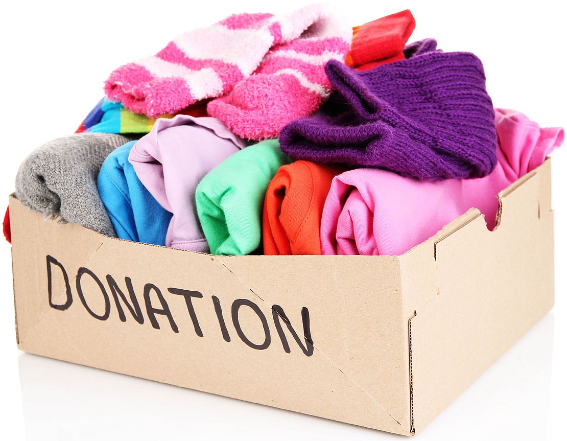 Box of clean clothing sorted for donation