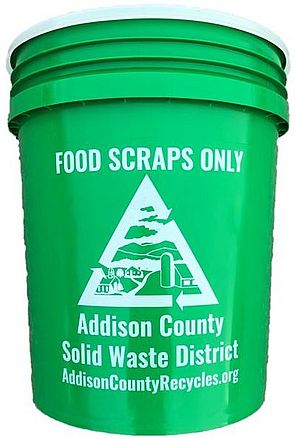 Green five-gallon bucket for food scraps