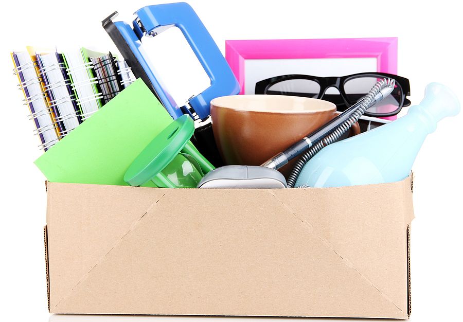 Box of household goods for donation.