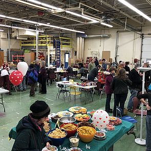 Repair Fair attendees enjoy refreshments and get items repaired by volunteers
