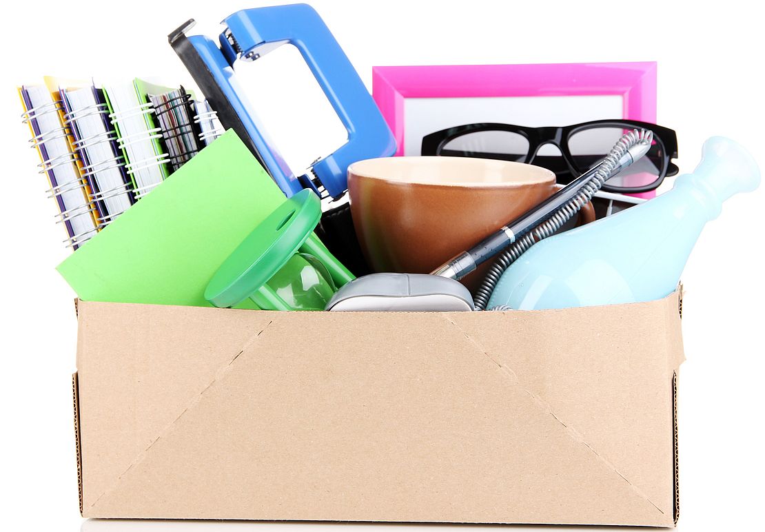Box of household goods for donation.