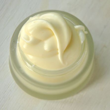 Small, plastic container of moisturizer 