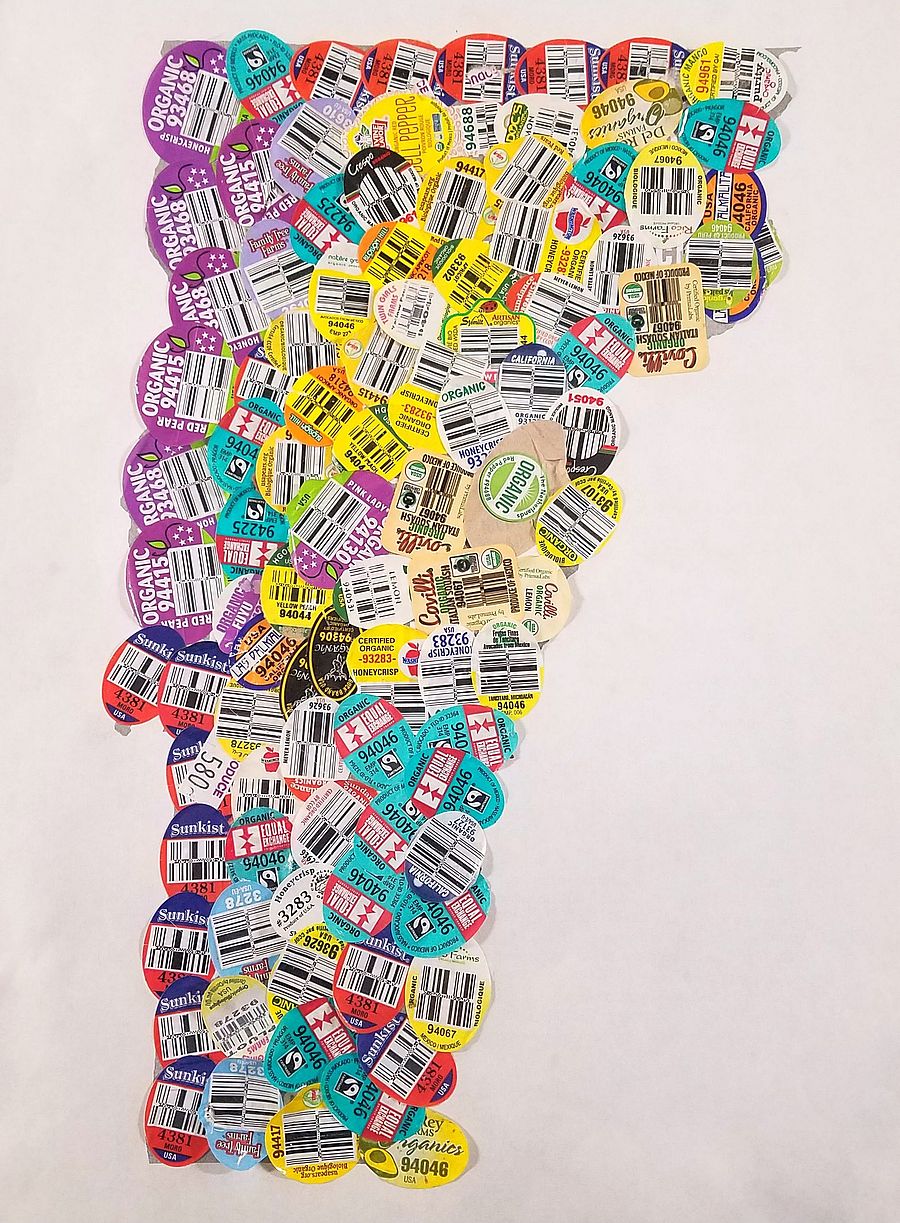 Produce stickers on a piece of paper in the shape of the state of Vermont