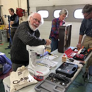 Volunteers fixing appliances at the February 2019 Repair Fair