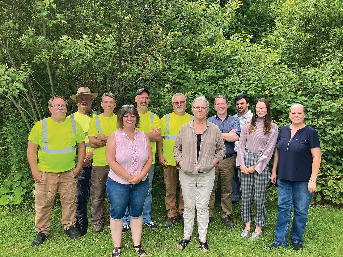 A photo of the staff of ACSWMD. From left is Brian Sherwin, Gary Hobbs, Jake Vukas, Chantel Bolduc, Chad Kimball, Gene Pouliot, Teri Kuczynski, Don Maglienti, Drew Pettis, Emily Johnston, and Shelly Edson.
